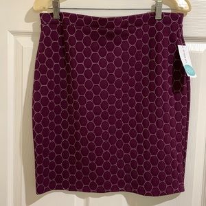 Modern design skirt. It is not a mini. Hits at my knee. Brand new never worn